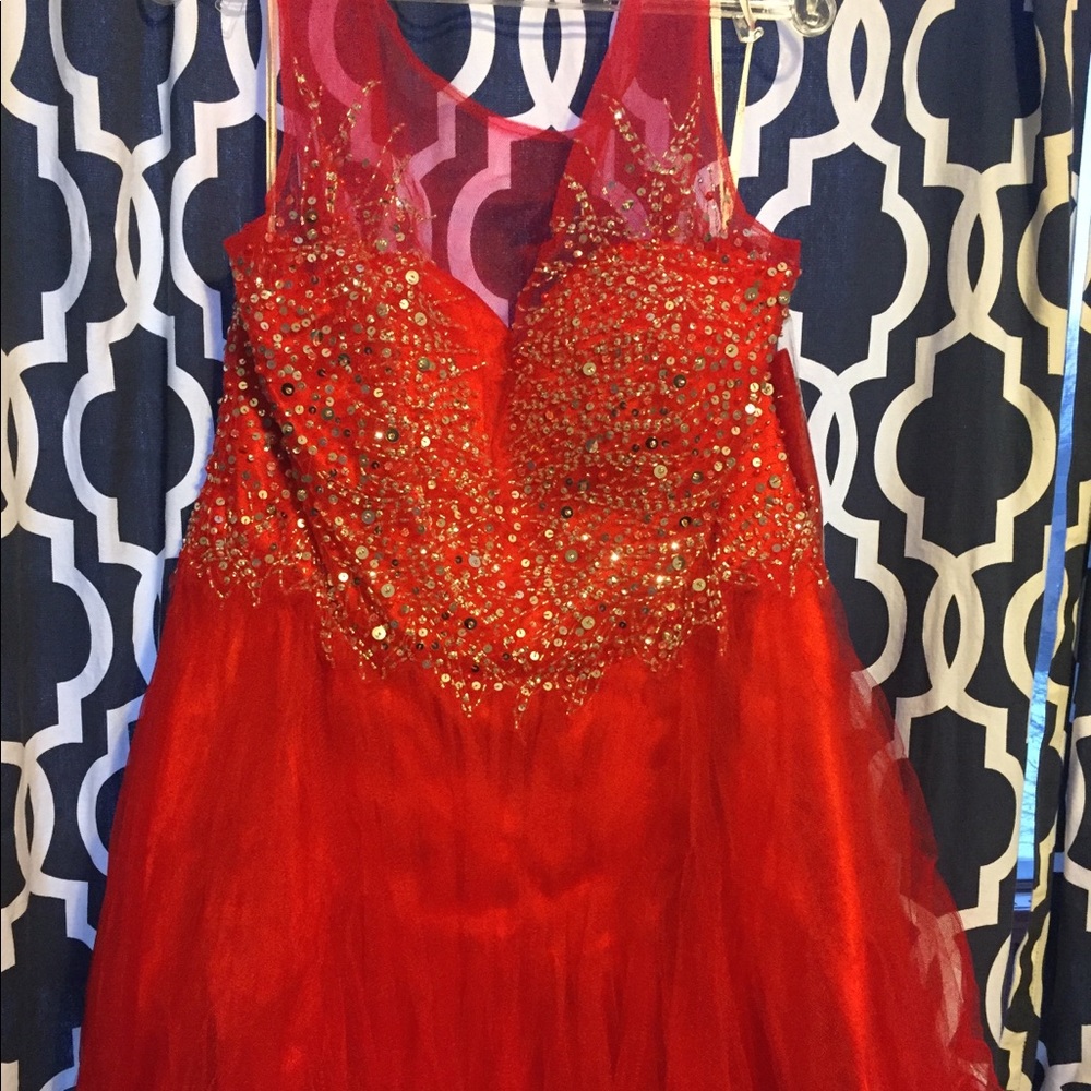 Red sequins homecoming or prom dress.